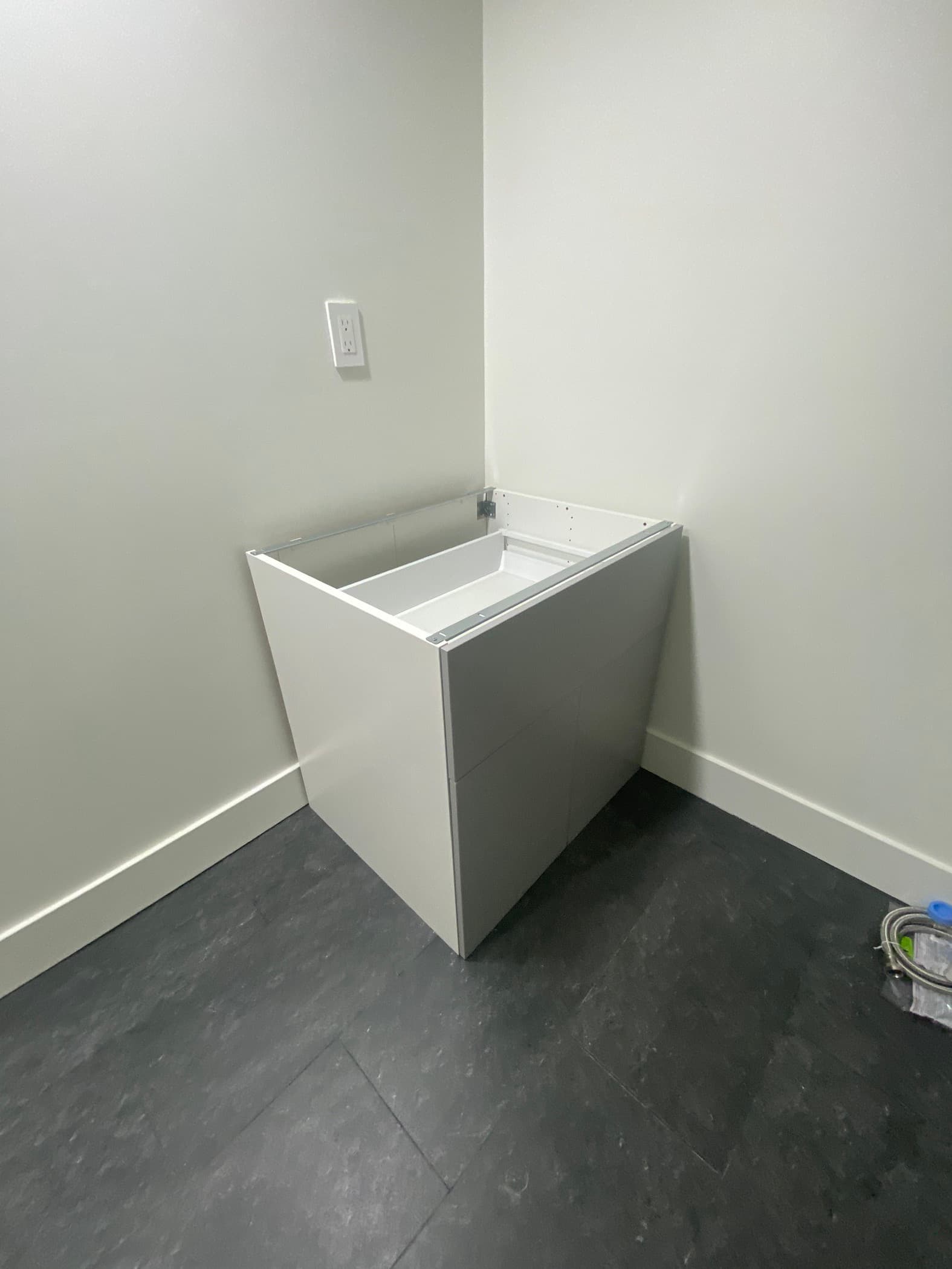 laundry room installation in progress, view 2