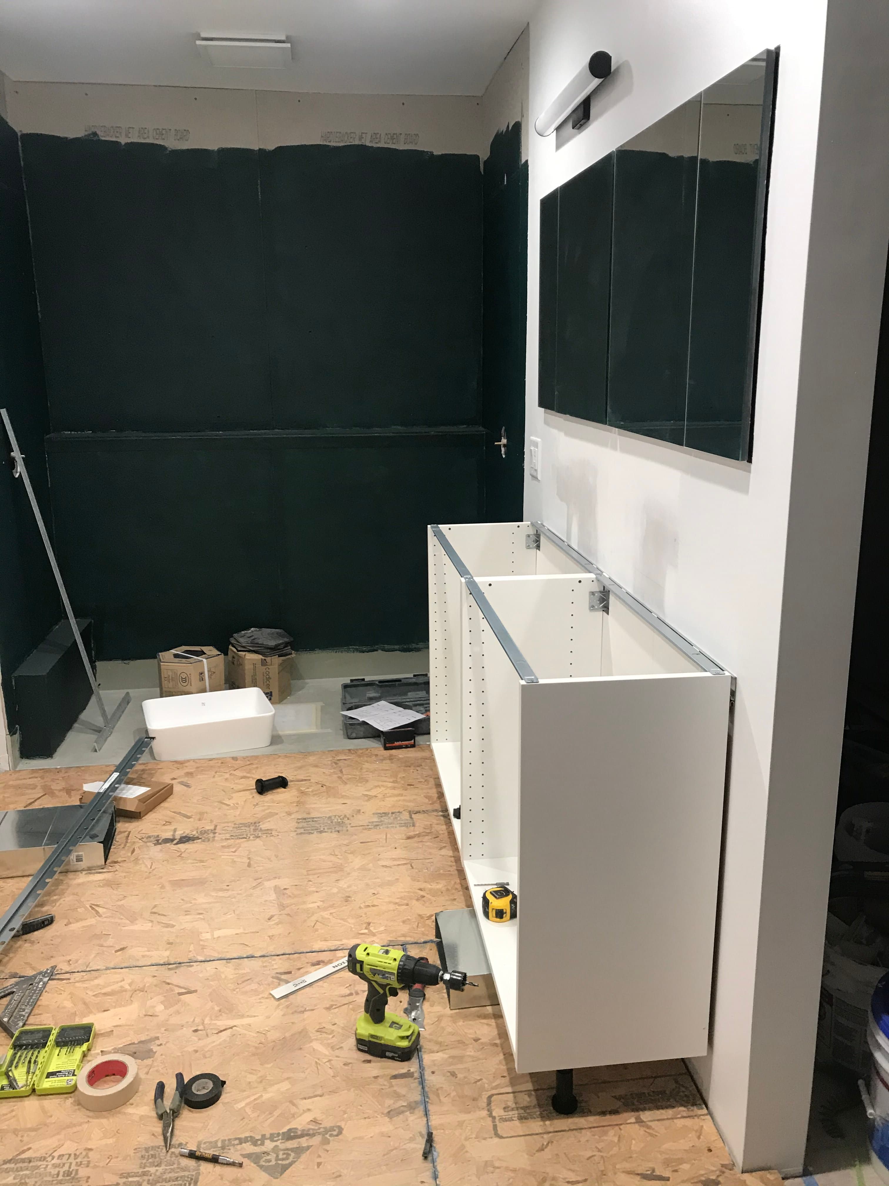 primary bathroom installation in progress, view 1